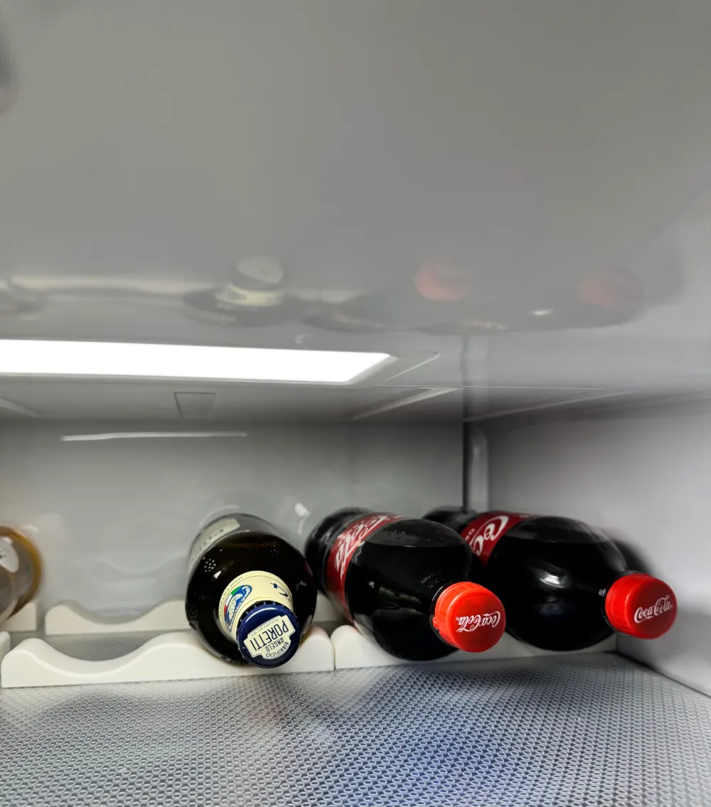 Refrigerator bottle stopper
